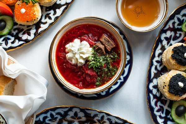 How to Prepare a Classic Russian Borscht with Beets and Dill Cream?
